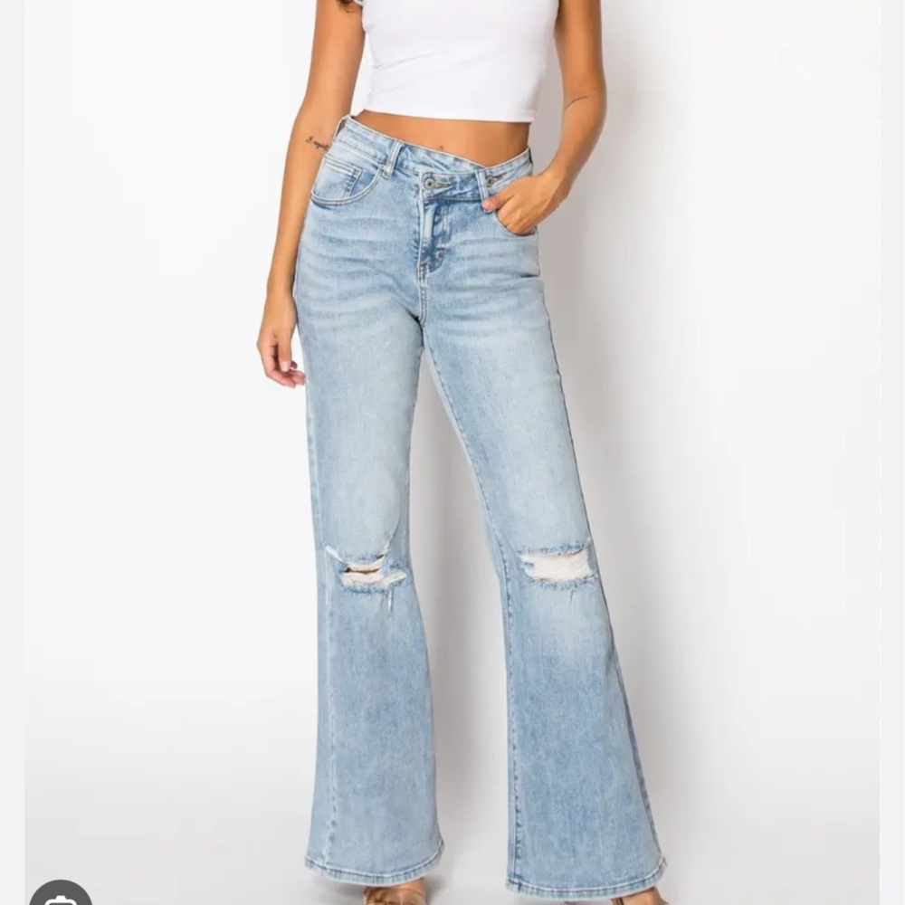 Light Wash High-Rise Distressed Flare Jeans - Women